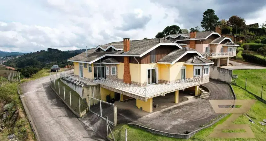 Casa com 6 dormitórios à venda, 260 m² por R$ 1.800.000,00 - Alataia - Campos do Jordão/SP