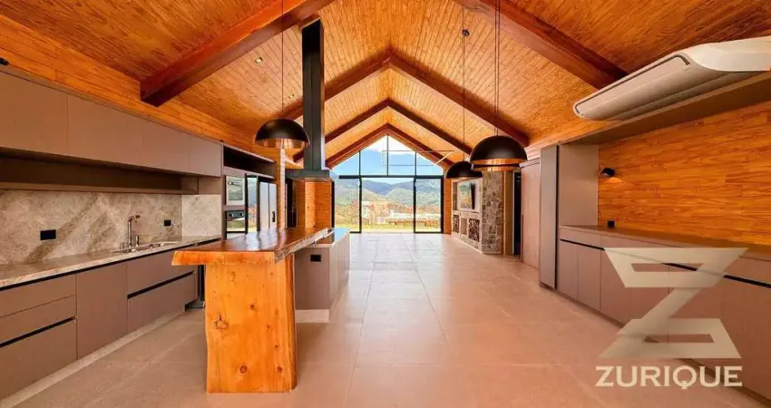 Casa com 3 dormitórios à venda, 324 m² por r$ 5.700.000 - condomínio iporanga - campos do jordão/sp