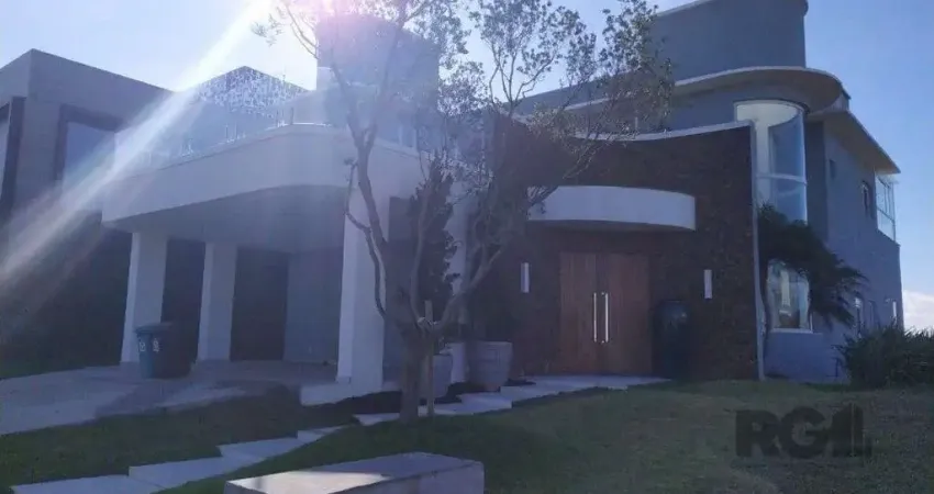 Linda casa para Comprar , mobiliada ,com 3 suítes no Condomínio Ponta da Figueir