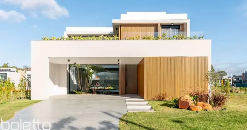 Linda casa para comprar com 4 suites em condomínio TOP