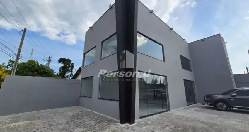 Casa comercial com 2 salas para alugar na Vila Areao, Taubaté 