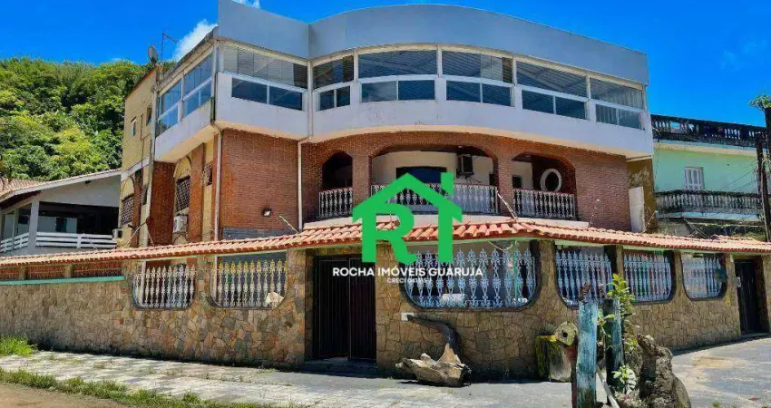 Casa com 6 quartos, 6 vagas, lazer, à venda em jardim guaiuba, guarujá.