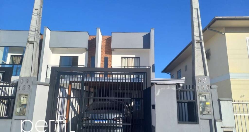 Casa à venda em Joinville-SC, bairro Costa e Silva: 2 quartos, 2 suítes, 1 sala, 3 banheiros, 2 vagas de garagem, 88,24m².