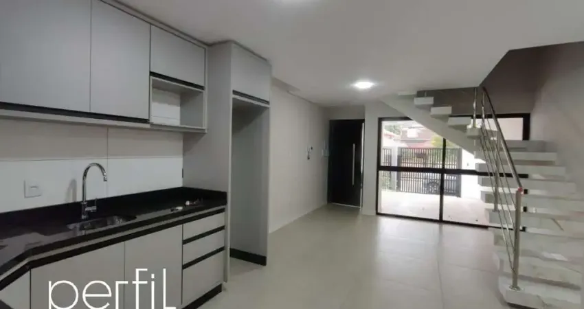 Imóvel à venda em joinville-sc: casa com 3 quartos, 1 suíte, 2 salas, 3 banheiros e 2 vagas de garagem no bom retiro - 106m².