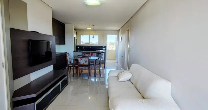 Apartamento semimobiliado com dois dormitórios e suíte no bairro kayser , próximo de tudo .