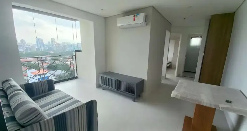 Apartamento tipo flat  mobiliado e equipado com 52m² para locação com 2 dormitórios varanda e 1 vag