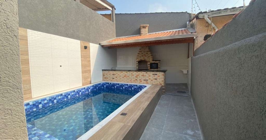Casa com 2 dormitórios à venda, 112 m² por R$ 720.000,00 - Vila Caiçara - Praia Grande/SP