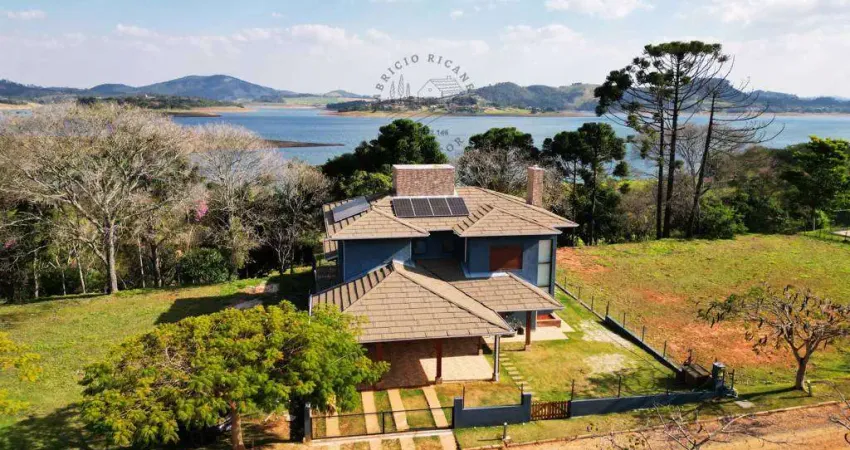 Casa pé na água à venda com 4 suítes no condomínio ponta das castanheiras em piracaia-sp