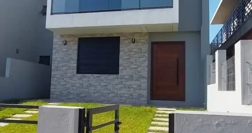 Casa à venda em Garopaba, três (03) dormitórios e financiável.