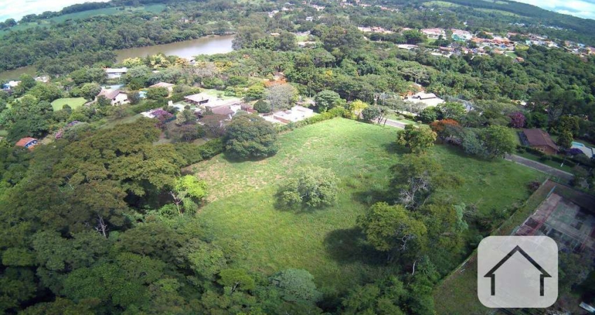 Excelente oportunidade! Terreno de 5740 m² em Condomínio Fechado, com a maior parte do terreno plano, ideal para construir sua residência dos sonhos.
