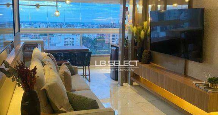 Apartamento alto padrãp no bairro Santa Mônica com três quartos e varanda gourmet.
