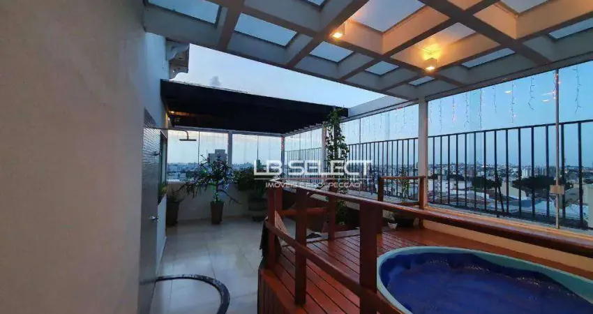 Cobertura no bairro Santa Mônica com quatro quartos e área gourmet.