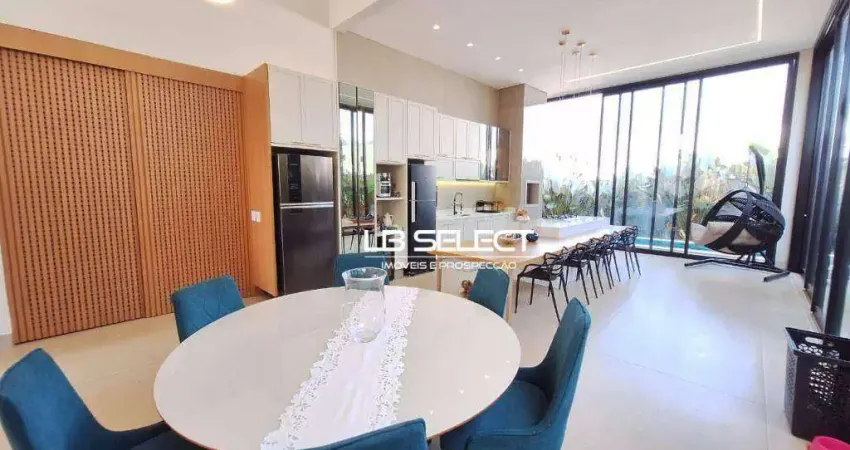 Casa no condomínio alphaville ii com quatro suítes e área gourmet.