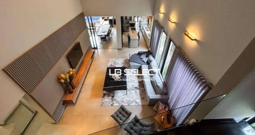 Casa nocondomínio splêndico com três suítes e área gourmet completa.