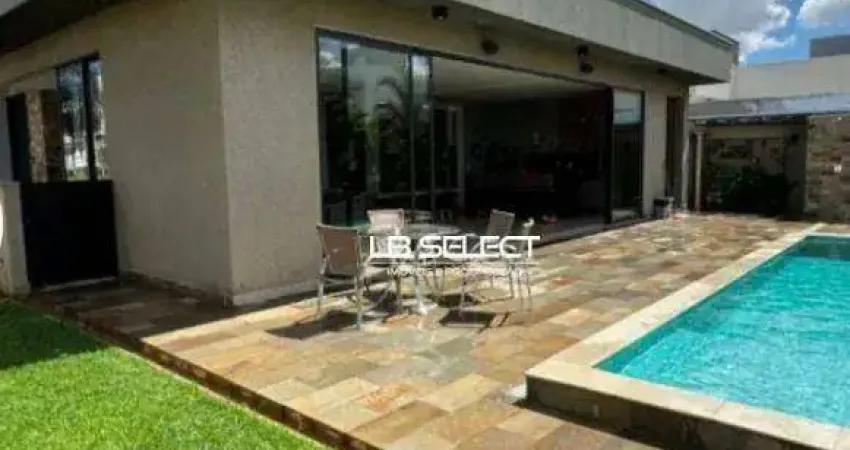 Casa no condomínio splêndido com quatro suítes e varanda gourmet completa.