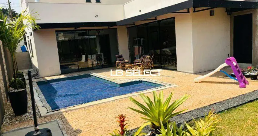 Casa no bairro Daniel Fonseca, com três quartos, piscina e varanda gourmet completa