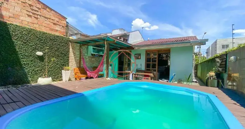 Casa com 2 quartos à venda na Avenida Zero Hora, 82, Jardim Algarve, Alvorada