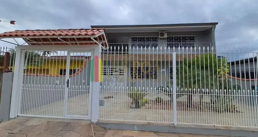 Casa com 3 quartos à venda na Rua Gaspar Martins, 894, Americana, Alvorada