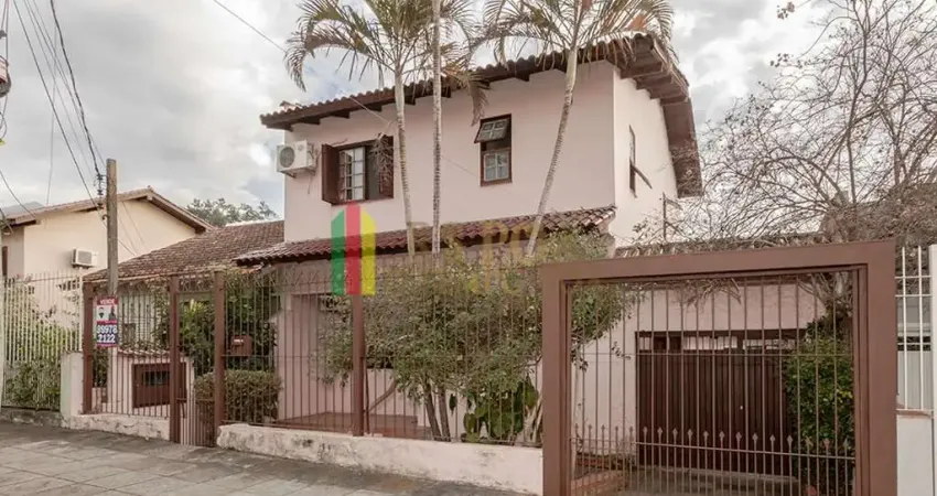 Casa com 4 quartos à venda na Rua Três Passos, 107, Passo da Areia, Porto Alegre
