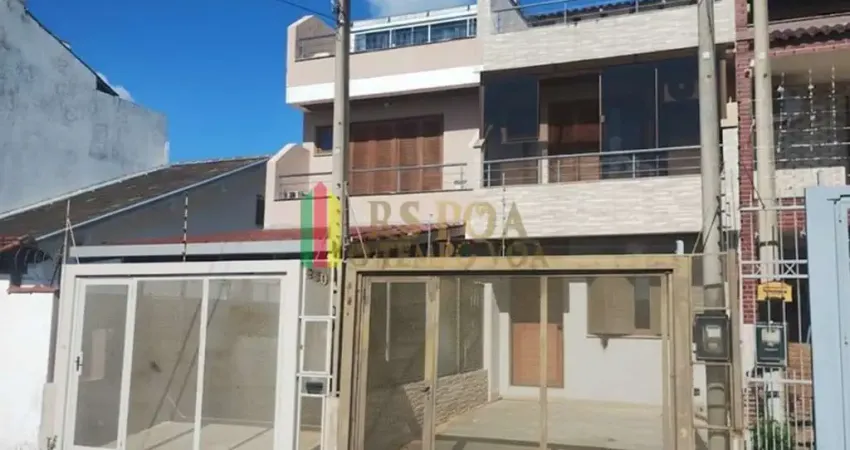 Casa com 3 quartos à venda na Rua Waldemar da Silva Tavares, 234, Guarujá, Porto Alegre