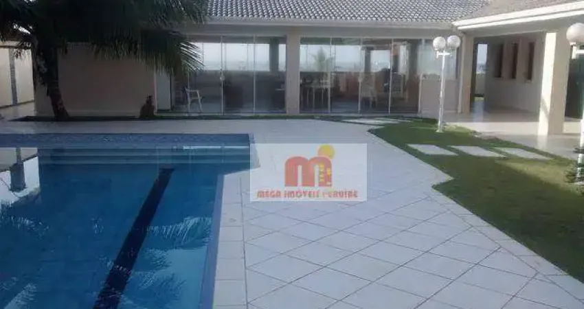 Casa com 4 dormitórios à venda, 500 m² por R$ 4.700.000,00 - Bougainvillee I - Peruíbe/SP
