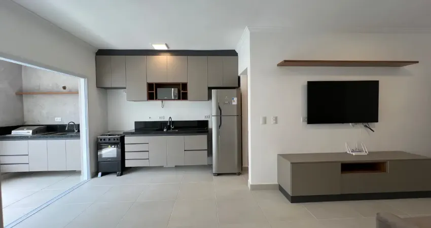 Apartamento em ubatuba a venda com 2 quartos com móveis novos e sacada gourmet na praia do itaguá
