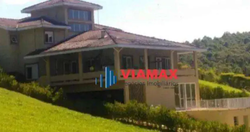 Casa com 7 dormitórios, 460 m² - venda por R$ 2.190.000 ou aluguel por R$ 9.000,00/mês - Zona Rural - Paraibuna/SP