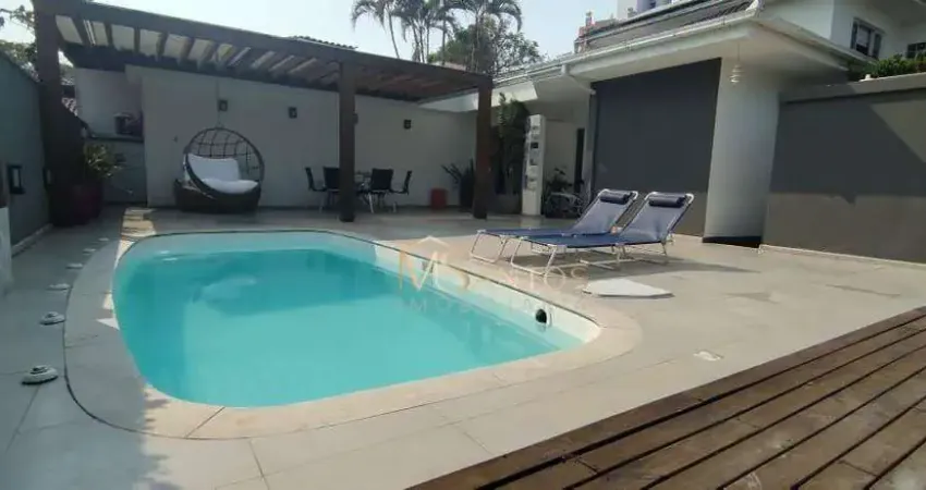 Casa com 5 dormitórios à venda, 300 m² por r$ 5.900.000,00 - jurerê internacional - florianópolis/sc