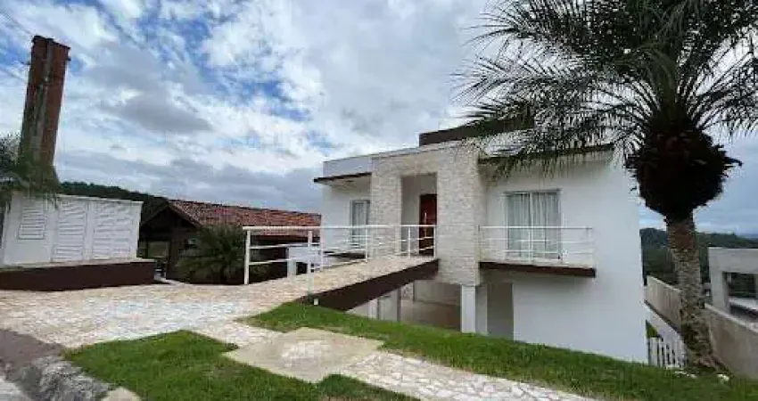 Casa com 4 dormitórios, 320 m² - venda por R$ 2.100.000,00 ou aluguel por R$ 12.000,00/mês - Condomínio Arujá Hills III - Arujá/SP