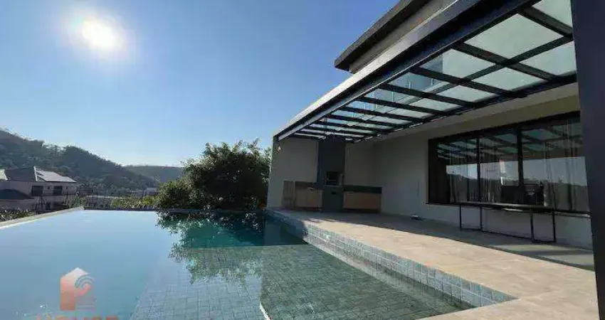 Casa com 4 dormitórios à venda, 603 m² por r$ 4.000.000,00 - condomínio reserva ibirapitanga - santa isabel/sp