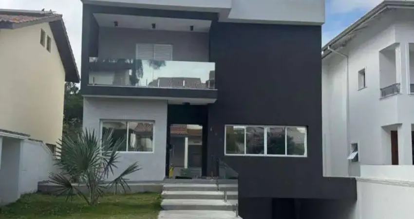 Casa com 4 dormitórios, 396 m² - venda por r$ 2.800.000 ou aluguel por r$ 13.500/mês - condomínio arujá 5 - arujá/sp