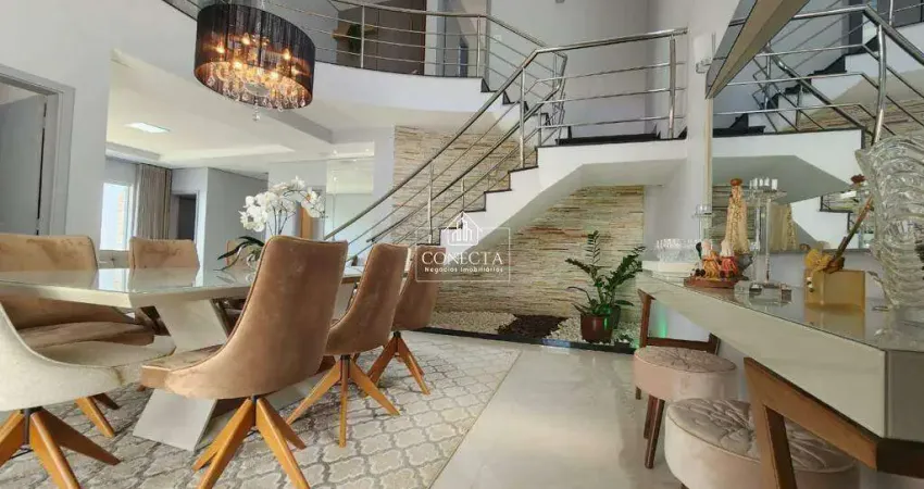 Casa tipo sobrado de esquina no bairro jardim karaiba, 340 m² de área construída, 4 suites, area de lazer completa