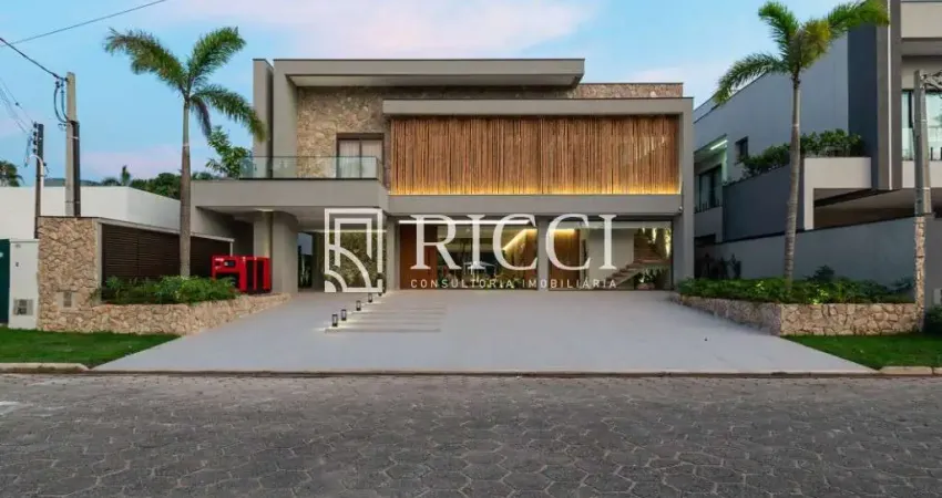 Luxuosa casa à venda em Guarujá-SP, no Jardim Acapulco, com 7 quartos, 7 suítes, 4 salas, 10 banheiros, 8 vagas de garagem e 1.679,29 m² de área.