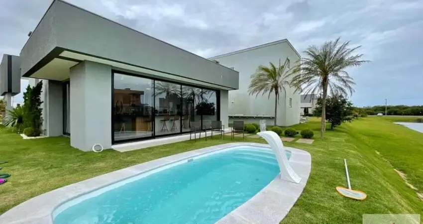 CASA MOBILIADA A VENDA EM CONDOMINIO RESERVA DAS AGUAS EM TORRES-RS.