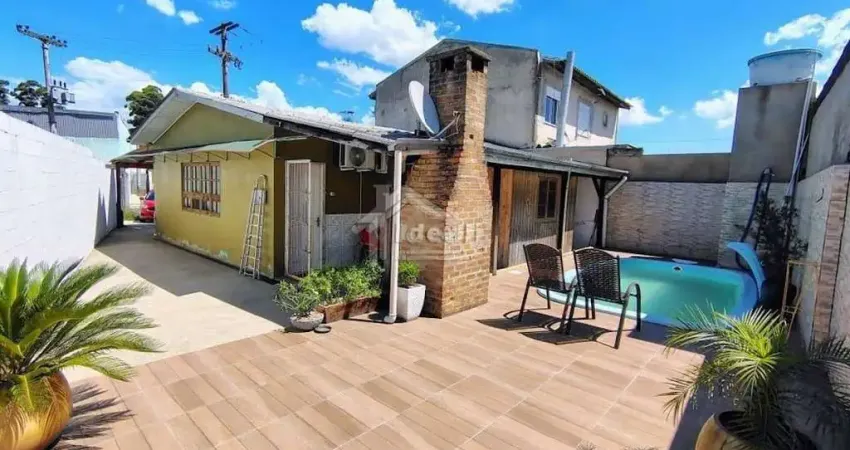 Casa com 4 quartos à venda na Rua Paulo Freire, 8, Vila Três Marias, Esteio