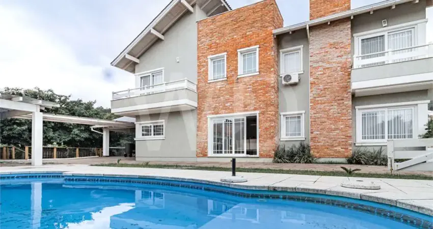 Casa em condomínio fechado com 3 quartos à venda na Avenida Edgar Pires de Castro, Hípica, Porto Alegre