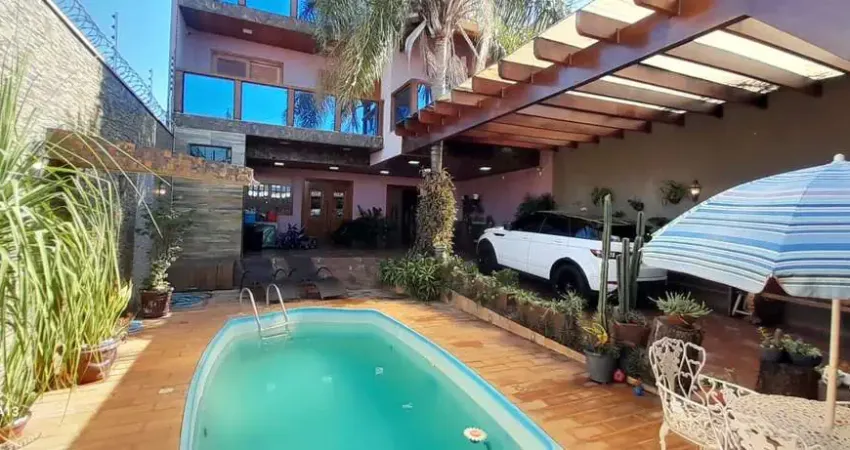 Linda casa triplex, 03 dormitórios, lazer completo, sauna, piscina aquecida. pq gramado.