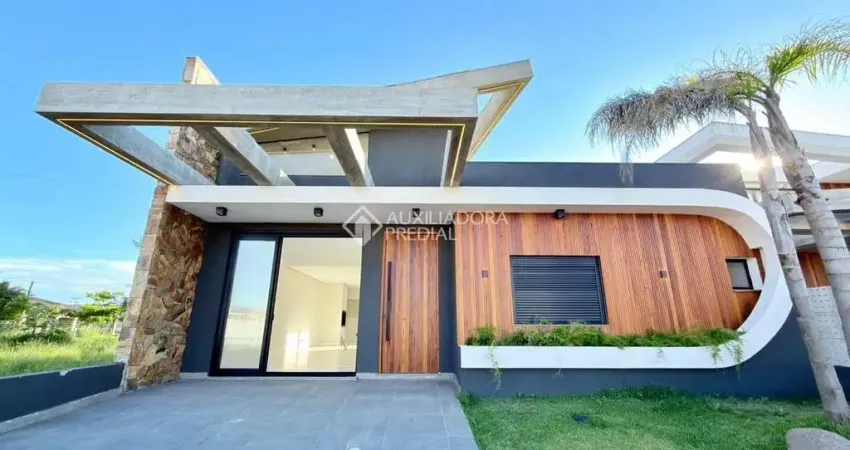 Casa com 3 quartos à venda na Rua Andira, 225, Jardim Beira Mar, Capão da Canoa
