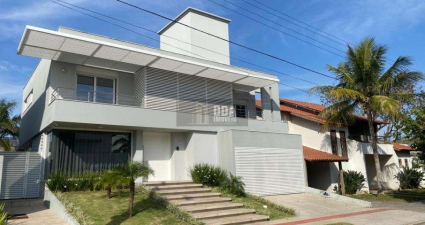 Casa aconchegante com 3 suítes em Jurerê Internacional