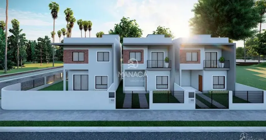 Dois sobrados (meio de quadra) 3 dormitórios sendo 1 suíte com sacada localizado em barra velha - sc