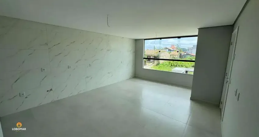 Apartamento com dois dormitórios, sendo uma suíte, no centro de Penha SC! À vend