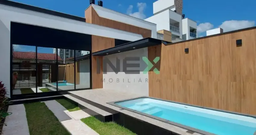 Casa nova 3 dormitórios 2 vagas piscina Centro em Camboriú - SC