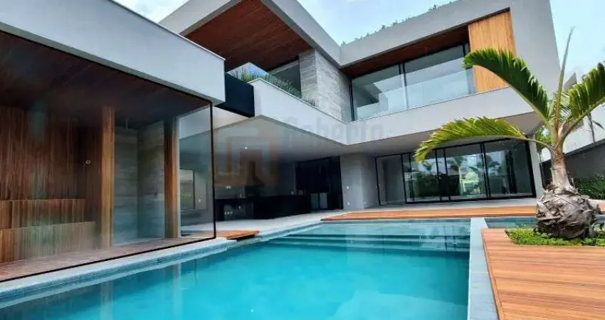 Primeira Locação Magnífica Casa à Venda Condomínio Alphaville Barra da Tijuca 1100m² Área Útil Terreno de 900m²  5 Suítes Piscina Sauna Varanda Goumet