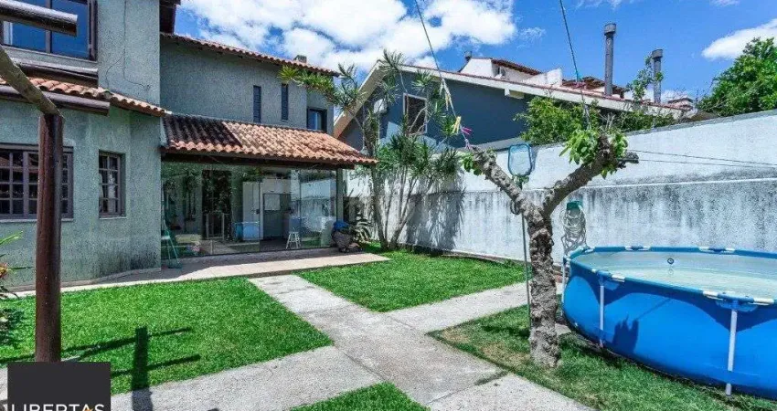 Casa com 4 quartos à venda na Rua Jayme Saul de Borba, 21, Espírito Santo, Porto Alegre