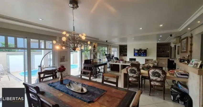 Casa em condomínio fechado com 5 quartos à venda na Rua Attílio Bilibio, 120, Jardim Carvalho, Porto Alegre