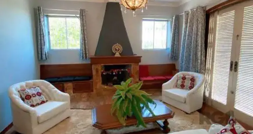 Casa com 4 quartos à venda na Rua Fernando Osório, 275, Teresópolis, Porto Alegre