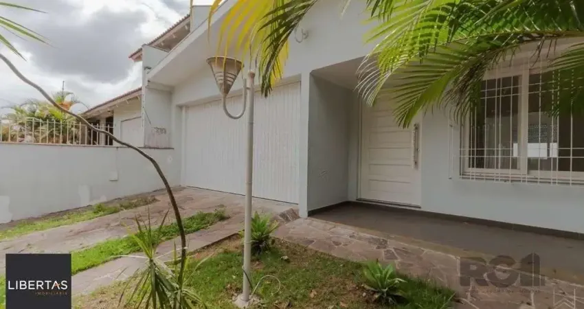 Casa 03 quartos, 02 vagas,próxima à Assis Brasil e Sertório.