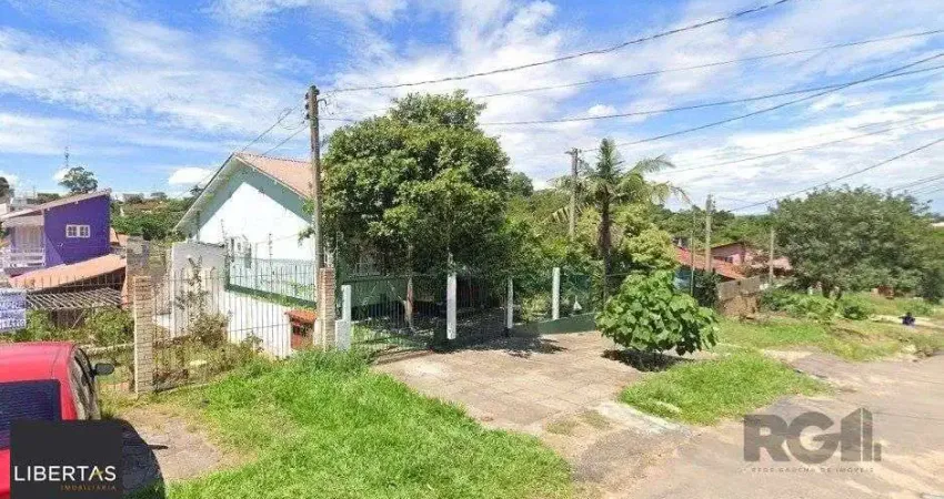 Casa com 3 quartos à venda na Rua Ênio de Souza, 226, Vila Nova, Porto Alegre