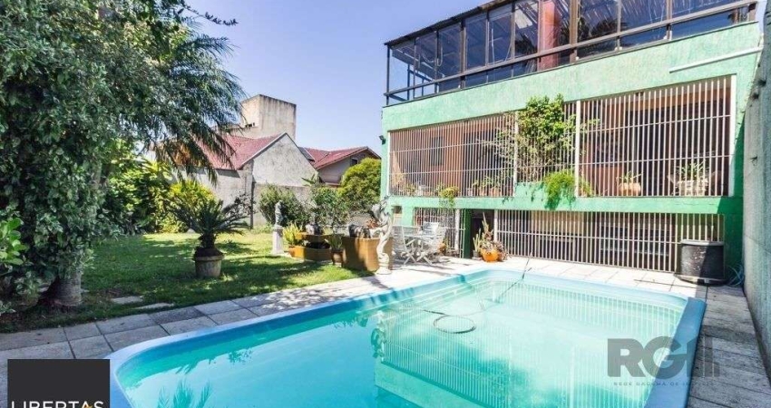 Casa 470m² - 4 dormitórios, 5 vagas no bairro Jardim São Pedro