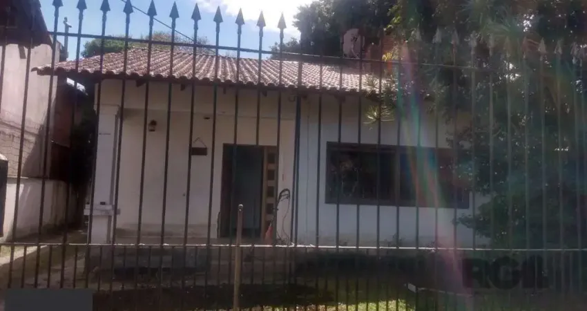 Casa com 3 quartos à venda na Rua Mura, 108, Guarujá, Porto Alegre